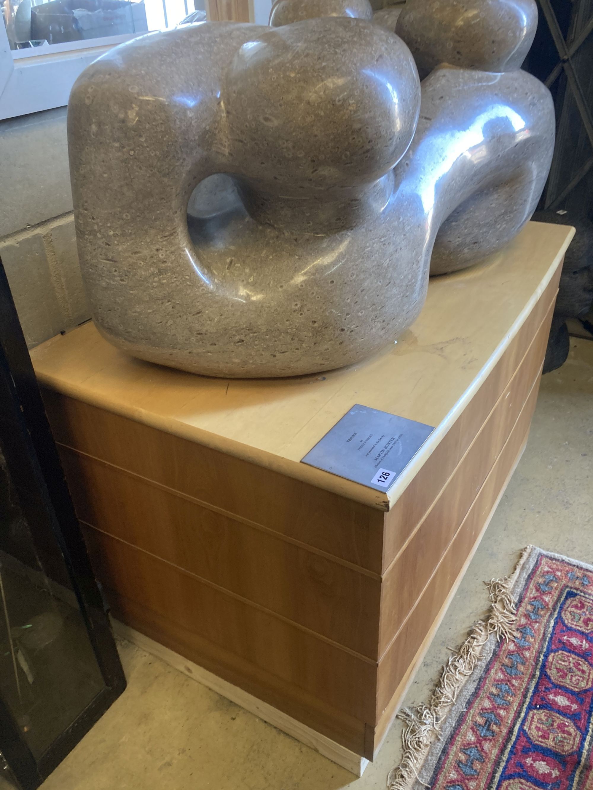 § Polly Ionides (born 1944) Triune, An abstract figural carved limestone group, width 106cm, depth 50cm, height 50cm